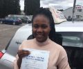 Anna with Driving test pass certificate